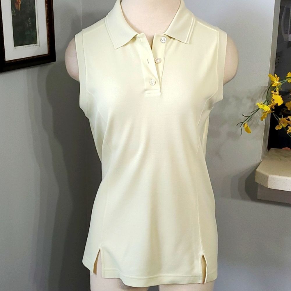 Henley style golf shirt collared with three buttons. 75% silk 25% cotton. Medium